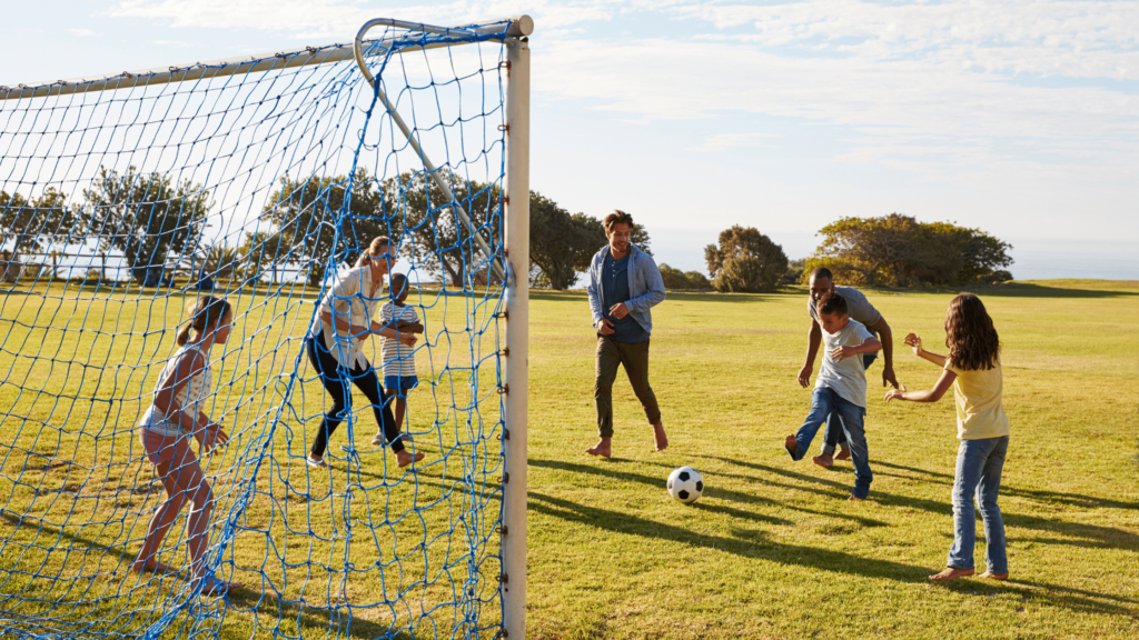 two families playing soccer together