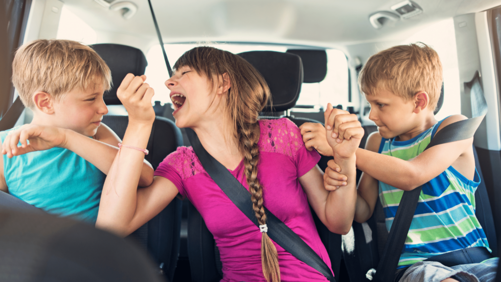 brothers and sisters arguing with each other in the car on the way to school