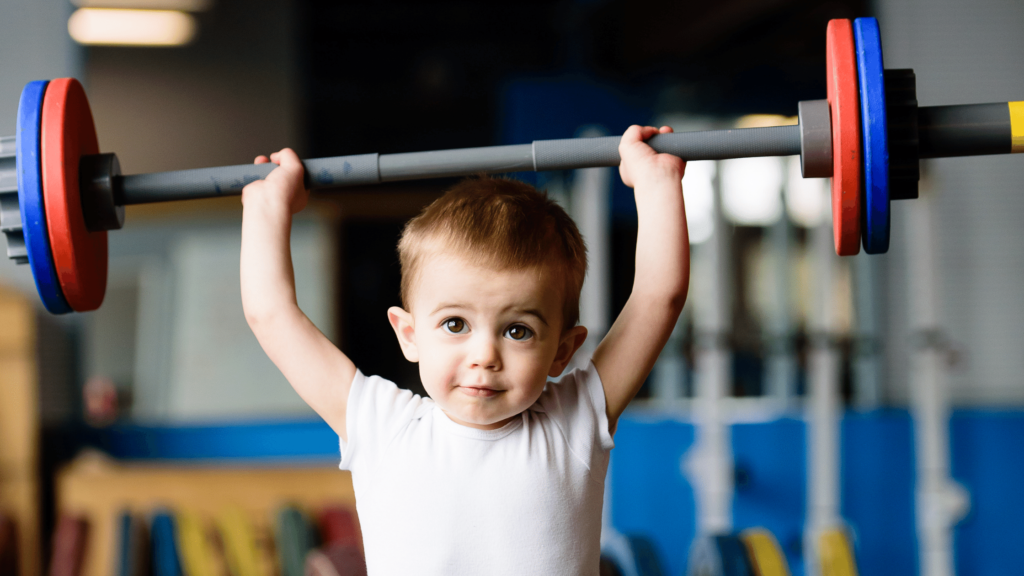 toddler lifting weights for fun