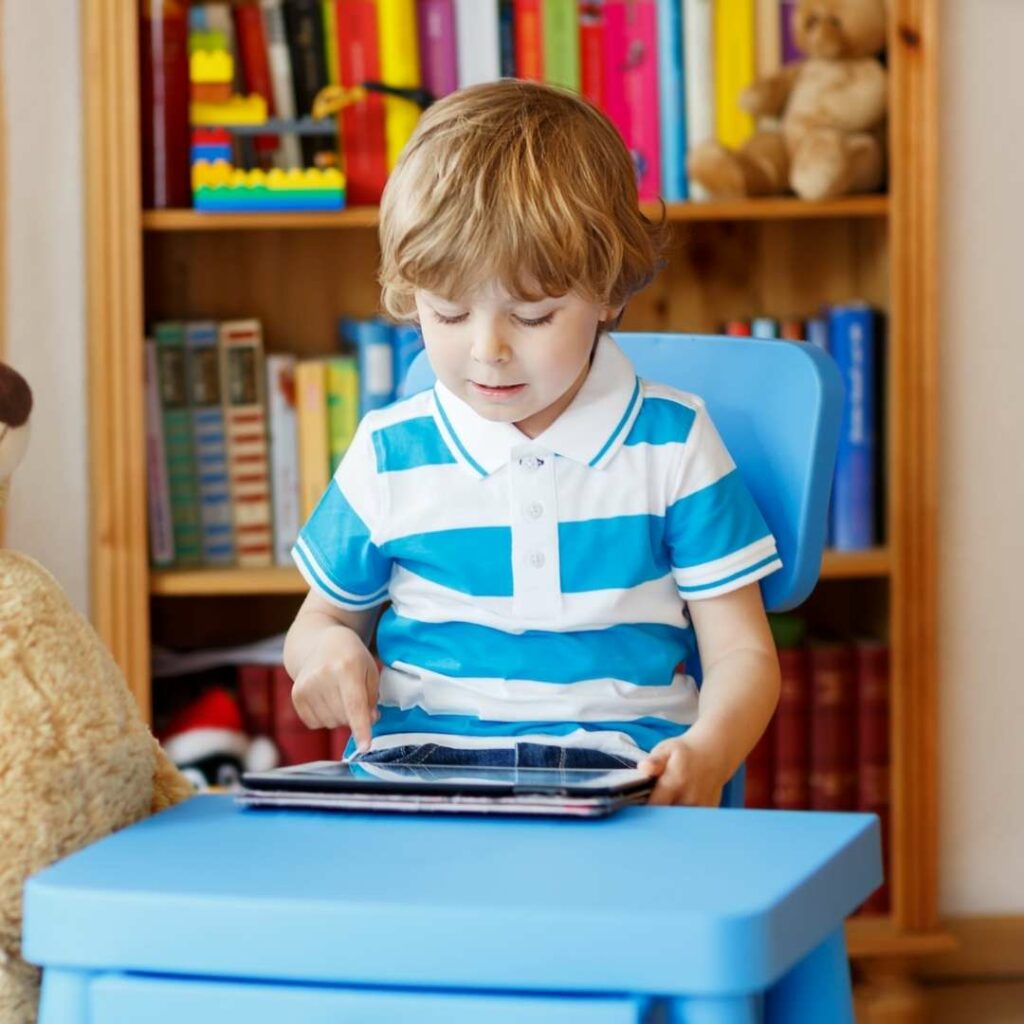 Toddler boy using a tablet