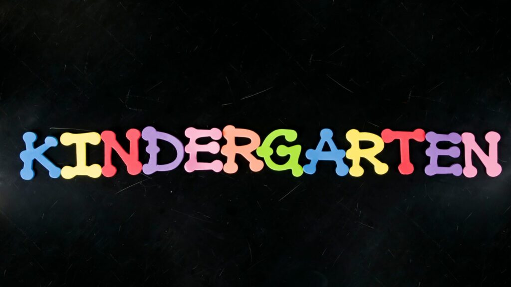 "kindergarten" spelled with knobby foam letters