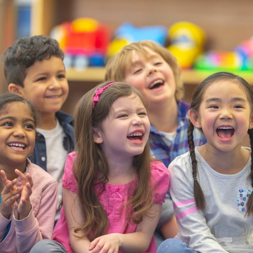 Small children laughing at lesson